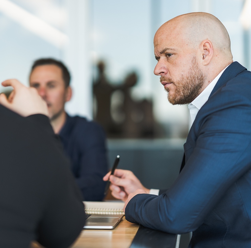 team members in a meeting